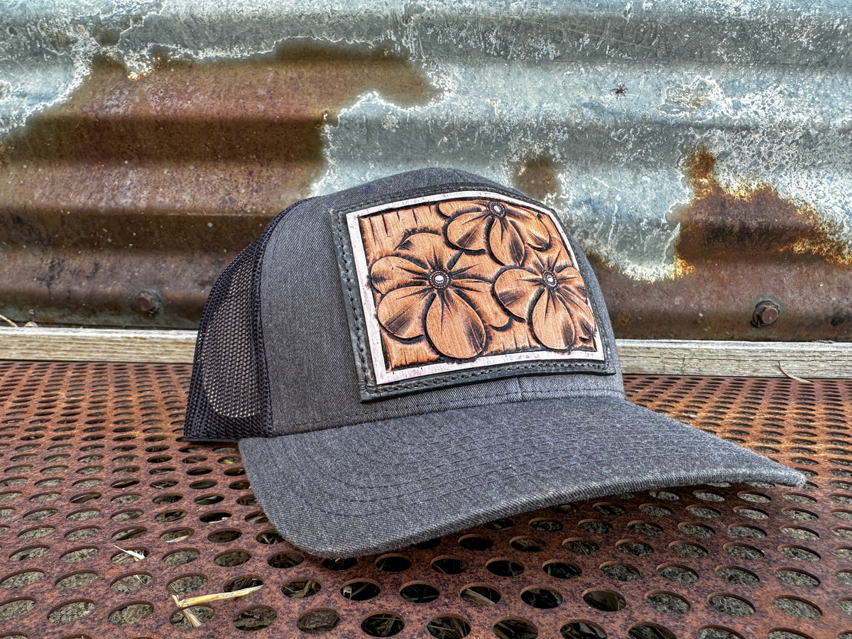 The Primrose Hand-Tooled Leather Patch Trucker Cap
