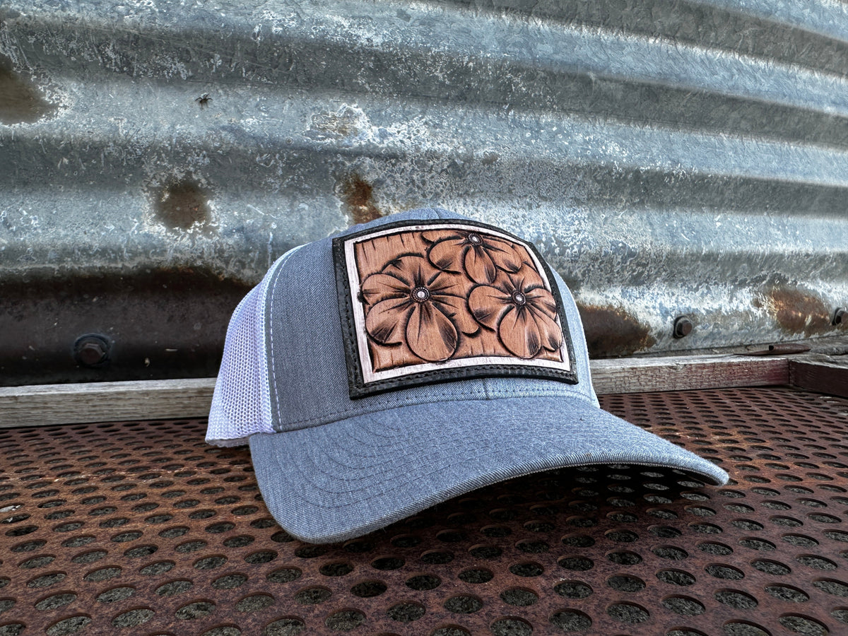The Primrose Hand-Tooled Leather Patch Trucker Cap