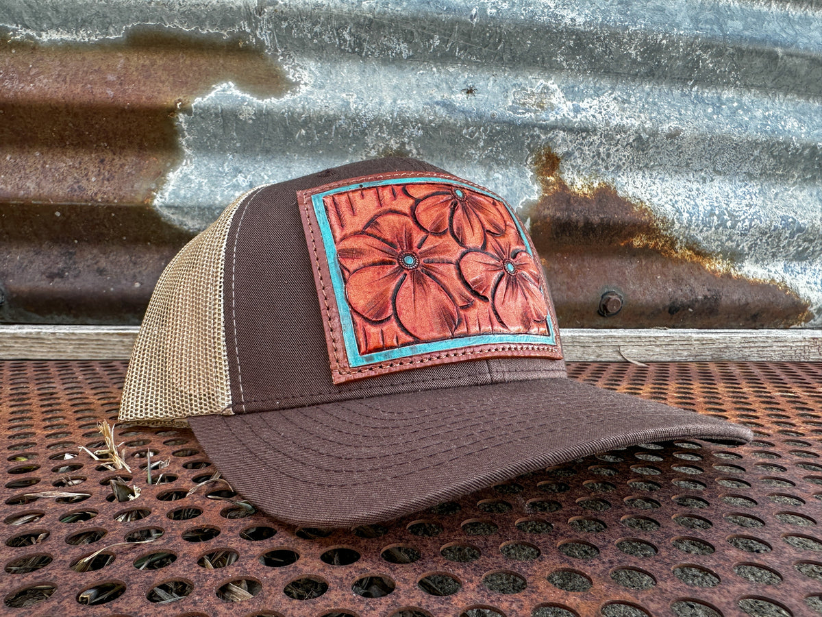 The Primrose Hand-Tooled Leather Patch Trucker Cap