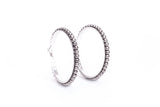 Worn Silver Trimmed Hoop Earring